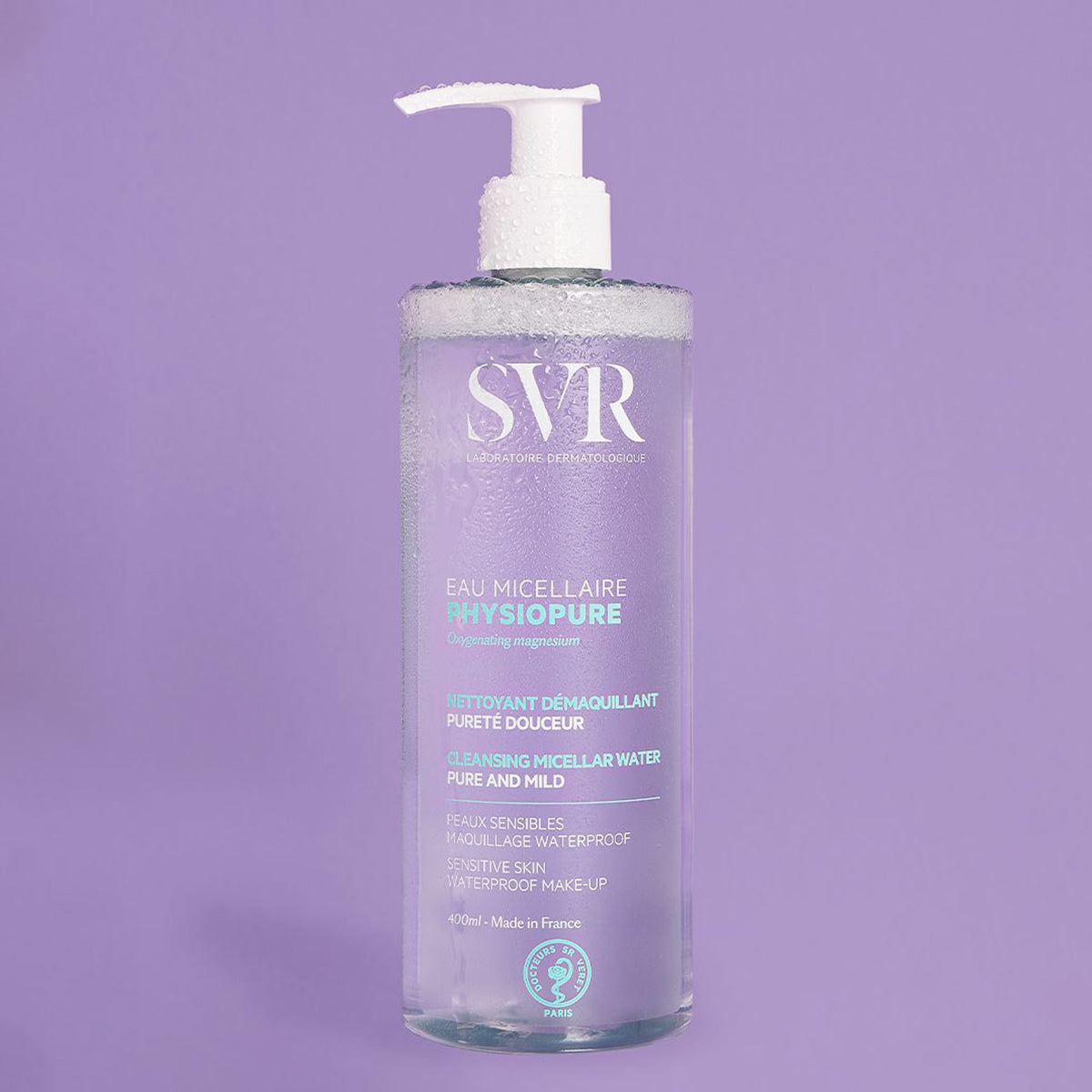 Envase de 400 ml del EAU Micellaire PHYSIOPURE de SVR en fondo morado
