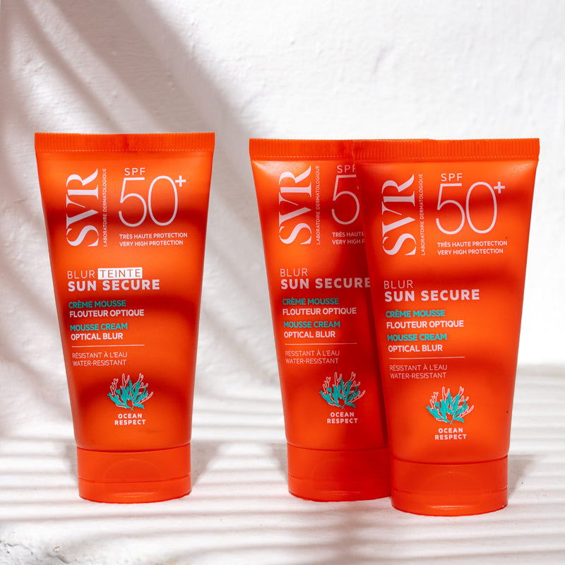 3 envases del Blur teinte Sunsecure de SVR donde le da la sombra del sol en un fondo blanco